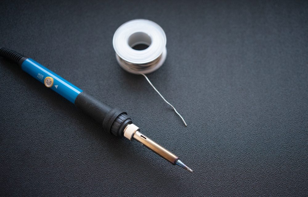 Soldering iron with solder.