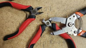 Assorted tools for making electronics.