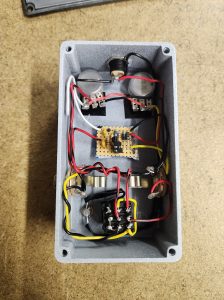 The inside wiring of a DIY Greer Amps Green Giant distortion pedal.